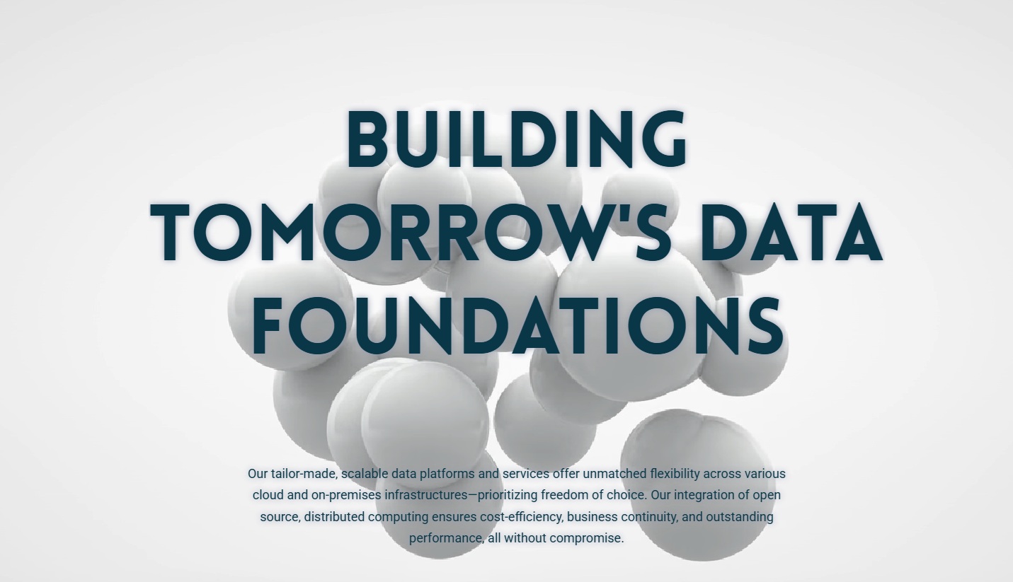 klarrio De grote tekst luidt "Building Tomorrow's Data Foundations" op een achtergrond van geclusterde witte bollen, met kleinere tekst die schaalbare, flexibele dataplatforms en -services beschrijft.